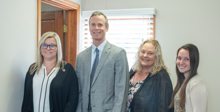 Attorney Donald W. Bedell with his office team